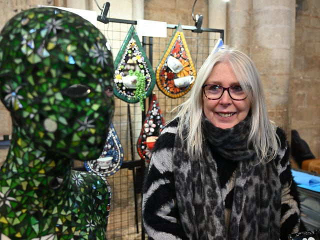 Karen Mann with her glass mosaics at Peterborough Cathedral Christmas market.