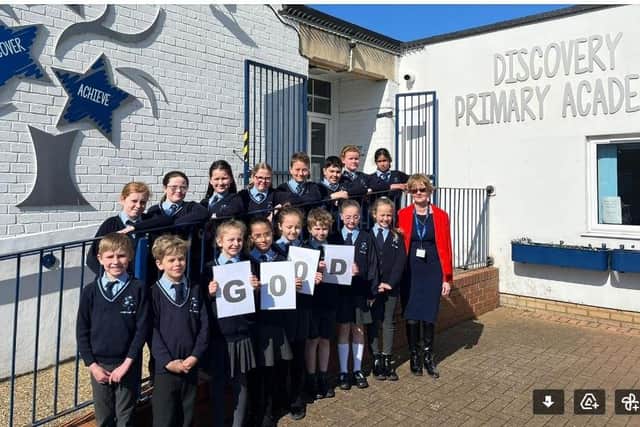 ​Headteacher Michelle Siequien and pupils at Discovery Primary Academy