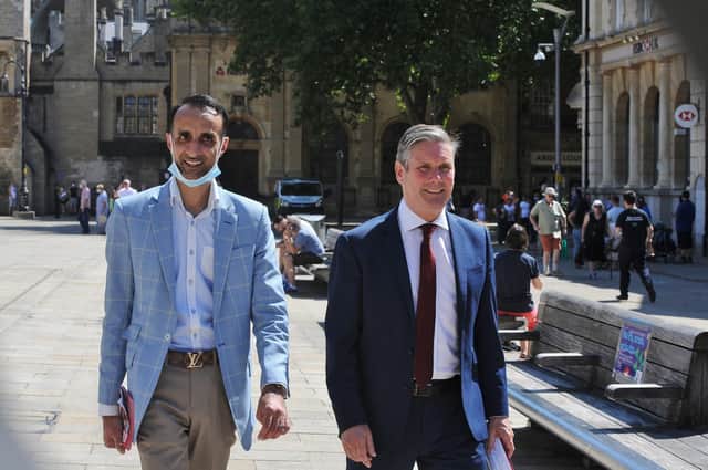 Sir Keir Starmer, leader of the Labour Party with  Shaz Nawaz   during a visit to Peterborough City Centre in 2020.
