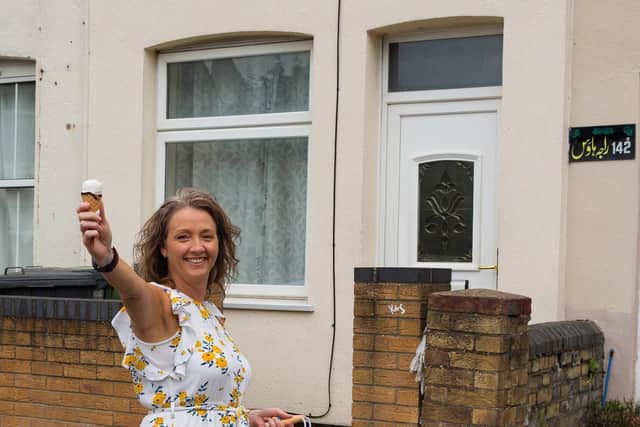 Kerrie outside the same house in Clarence Road in 2020