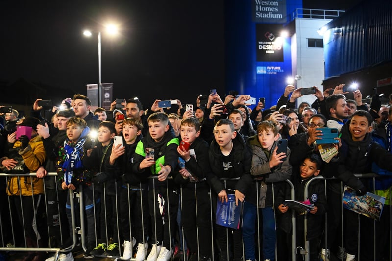 Young fans wait for player arrivals outside the stadium prior to the Emirates FA Cup Fifth Round match between Posh and Manchester City.