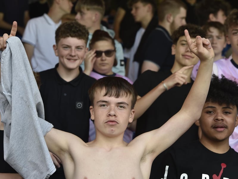 Peterborough United fans watch the draw with Leyton Orient.