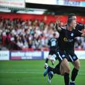 David Ball celebrates a goal for Posh at Stevenage in a 2011 EFL Cup tie. Photo: Alan Storer.