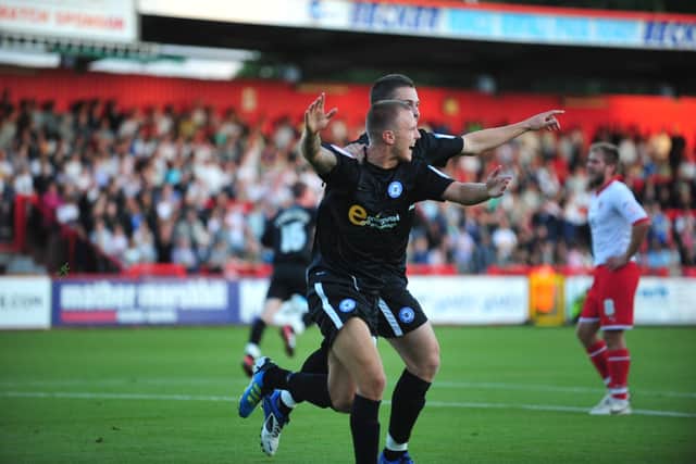 David Ball celebrates a goal for Posh at Stevenage in a 2011 EFL Cup tie. Photo: Alan Storer.