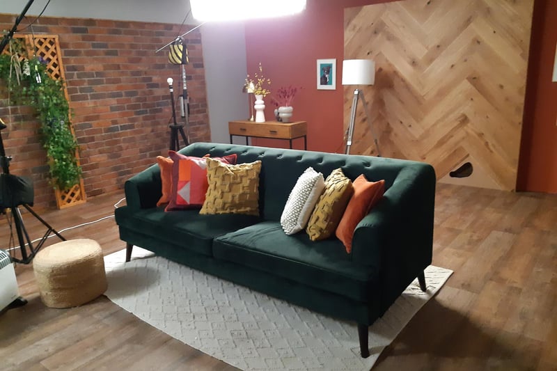 This is the famous 'backstory couch.' This cosy crew-built TV set is where prospective owners sit down and tell the viewers about their lives, their jobs and their reasons for wanting to adopt a dog. This is one of the only areas where human camera operators film; almost all other areas are filmed with covert cameras to ensure the dogs remain calm and undistracted.