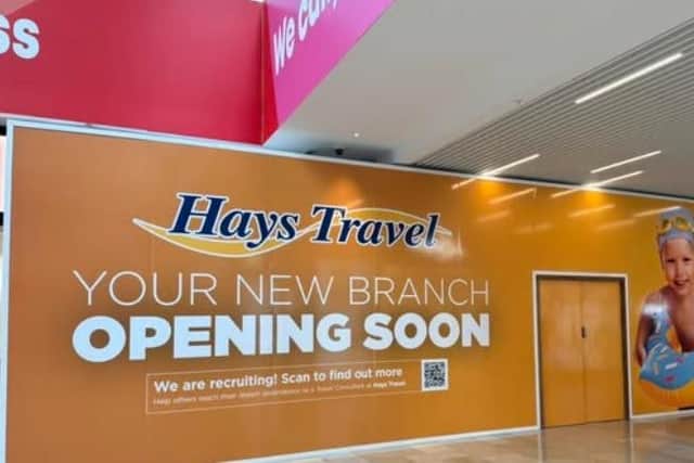 The hoarding across the frontage of the new Hays Travel store in the Queensgate Shopping Centre in Peterborough