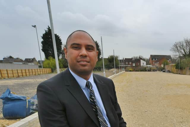 Dr Neil Modha at the site of the proposed pool