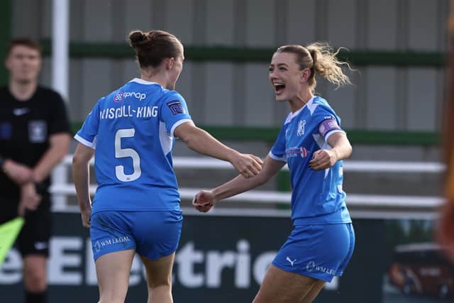 Evie Driscoll-King and Keir Perkins celebrate the former's match-winning goal against Hull City. Photo Darren Wiles