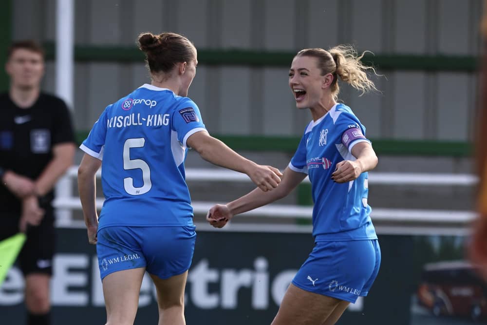 Evie Driscoll-King and Keir Perkins celebrate the former's match-winning goal against Hull City. Photo Darren Wiles
