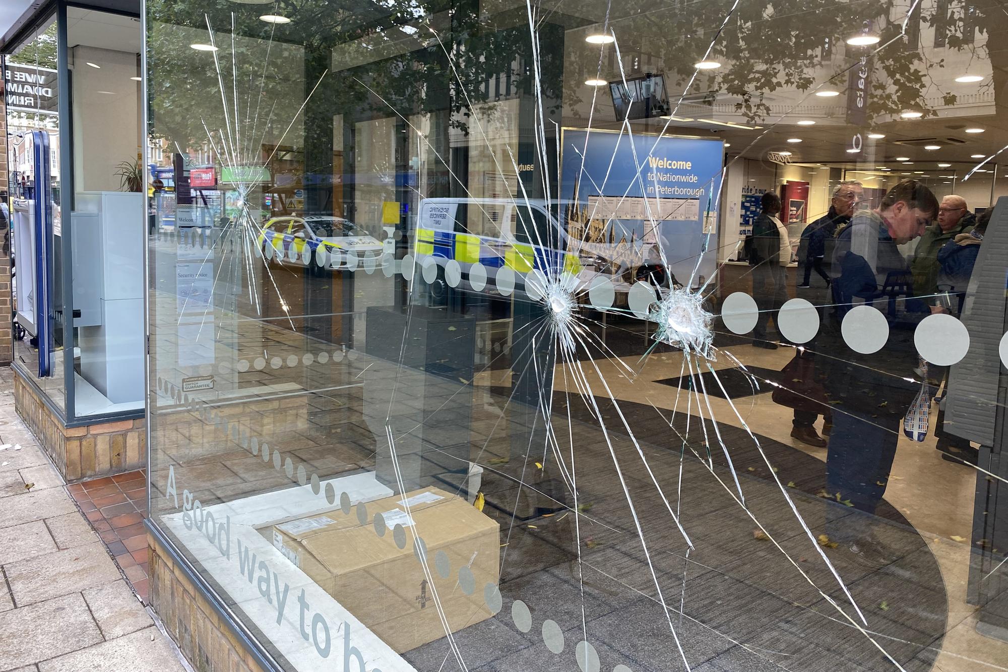 Man arrested after windows smashed at Peterborough bank