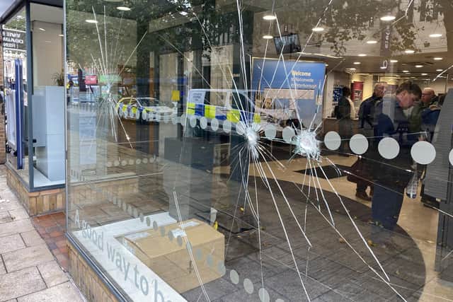 Man arrested after windows smashed at Peterborough bank