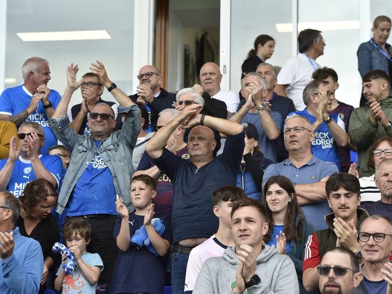Peterborough United fans watch their side's defeat to Derby County.