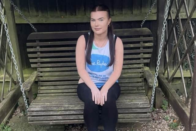 This is the first time 18-year-old Kellie Hall has run a marathon