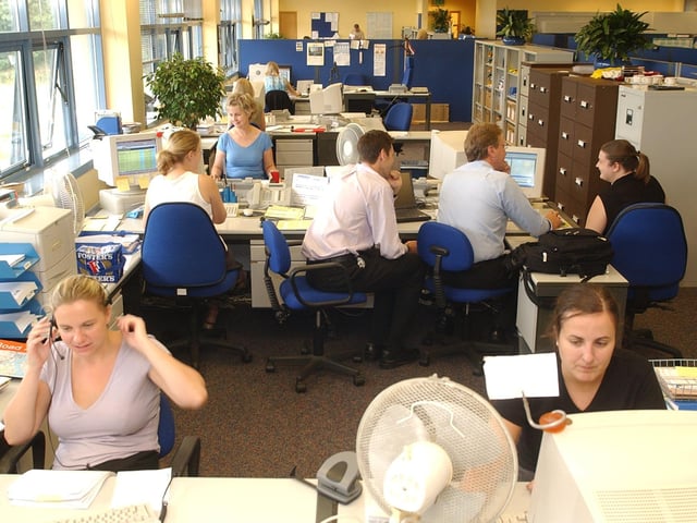 Staff at the former Norwich and Peterborough Building Society's offices in Lynch Wood, Peterborough, before the company's merger with the Yorkshire Building Society in 2011.