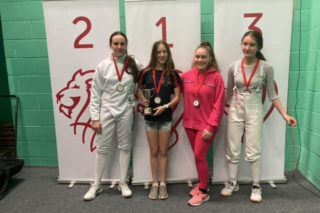 Isabella Howser with her England Under 15 trophy.