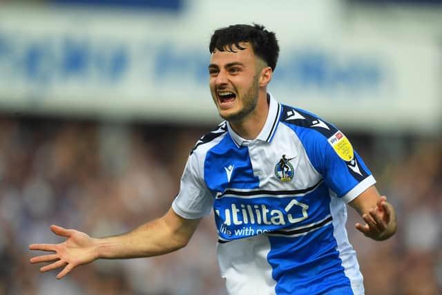 Aaron Collins celebrates a goal for Bristol Rovers. (Photo by Harry Trump/Getty Images)