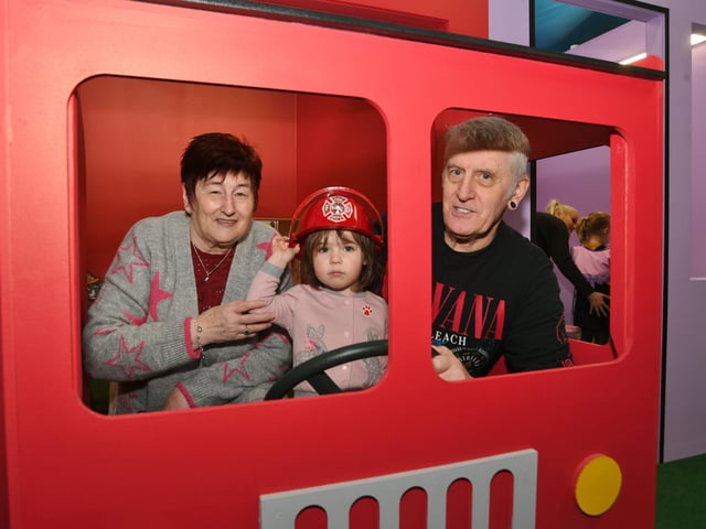 Opening of the Inspired Playtown at Hampton. John and Susan Dixon with granddaughter Skylar Compton
