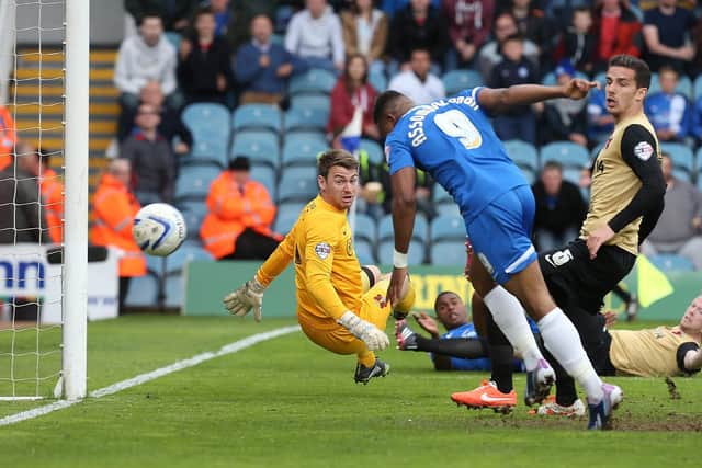 Britt Assombalonga scores for Posh v Orient in a 2014 League One play-off semi-final at London Road. Photo Pete Norton/Getty Images