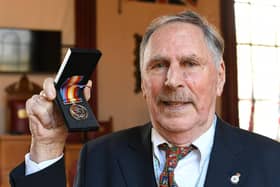 Dr Alan Dowson with his Nuclear Test Medal.