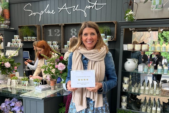 Designer Sophie Allport with her four stars certificate for her trade stall at the Chelsea Flower Show in 2022