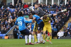 Oxford goalkeeper Simon Eastwood claims a last-minute cross in the game at Posh. Photo: Joe Dent/theposh.com.
