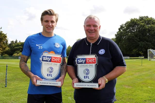 Jason Cummings with his League One Player of the Month award in August 2018.