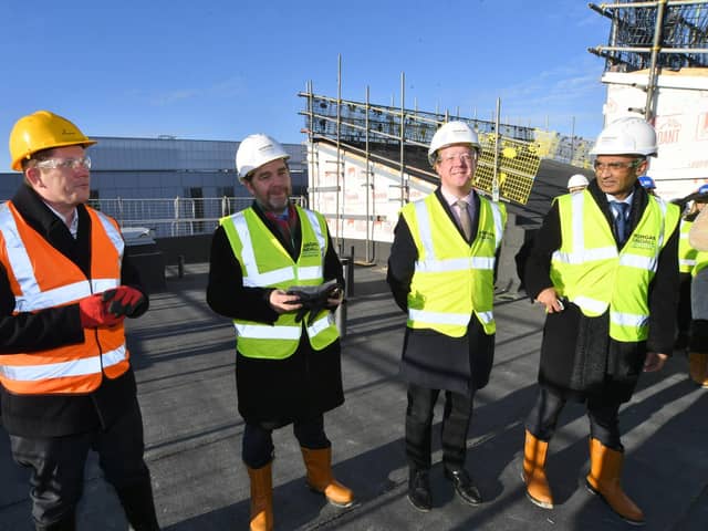 At the topping out ceremony at the ARU phase 3 building at Bishop's Road.
