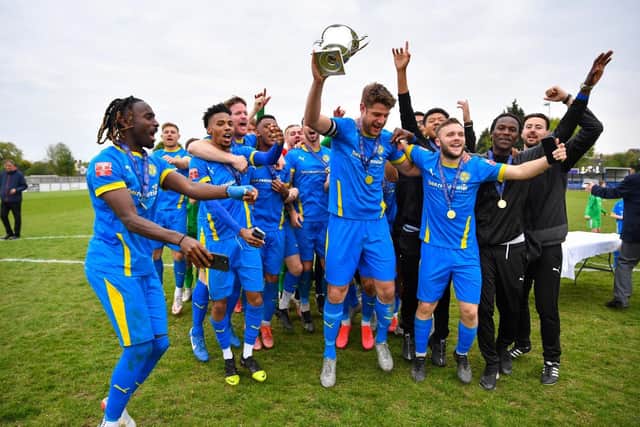 Peterborough Sports celebrate their play off victory over Coalville to secure their place in the National League system.