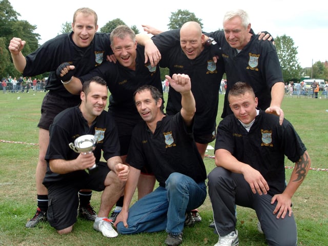 Jubilant Ashfield Rugby Club members who won tug of war against the Army at the Ashfield Show in 2006.