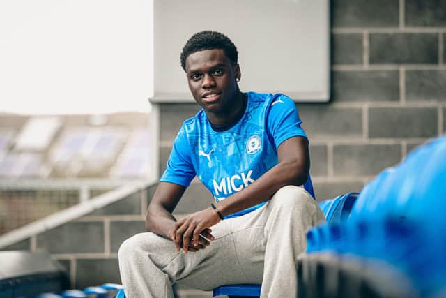 Justin Osagie after signing for Posh. Photo Joe Dent/theposh.com
