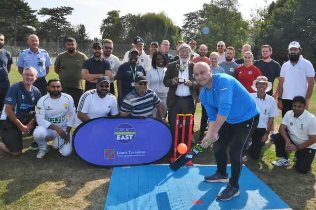 Central Park Fun Day. Cricket match between the Peterborough Joint Mosques Council and Cambs Police with Peterborough City Council. At the crease -  Chief Constable Nick Dean.