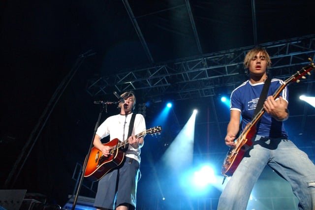 Busted and co performing in concert on The Embankment,