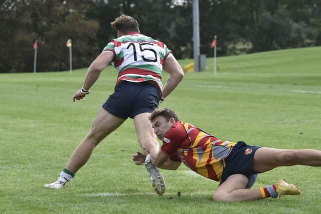 Borough's Byron Van Uden makes a tackle against Lutterworth. Photo: David Lowndes.