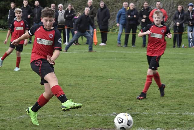 Action from Netherton (red) v Feeder Under 12s at the Grange. Photo: David Lowndes.