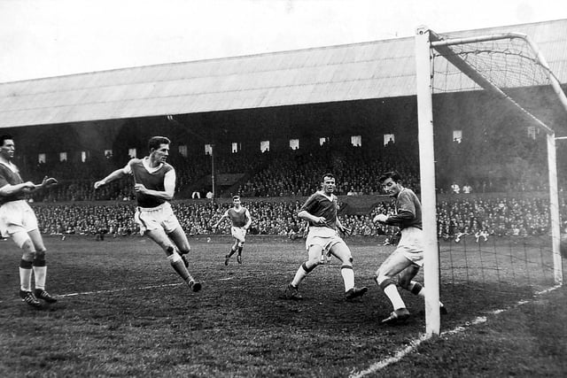 Terry Bly, pictured scoring one of his many Posh goals, owned a sports shop in Grantham for many years. He also managed the town's football team for 15 years. Bly passed away in 2009.