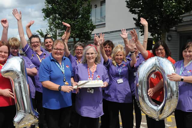 Cross Keys Homes' care workers from Kingfisher Court in Peterborough celebrating the 10th anniversary.