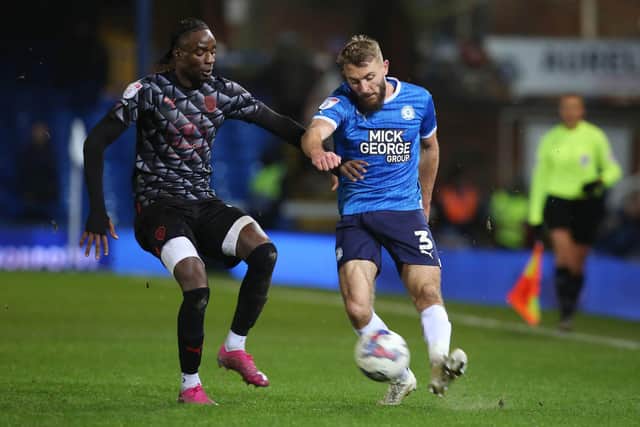 Dan Butler (right) in action for Posh. Photo: Joe Dent/theposh.com.