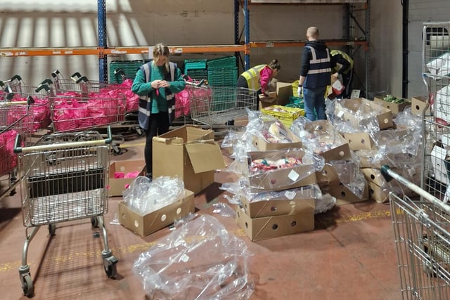 Preparing the Christmas hampers at the Yours Clothing warehouse in Peterborough.