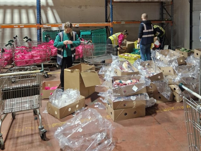 Preparing the Christmas hampers at the Yours Clothing warehouse in Peterborough.