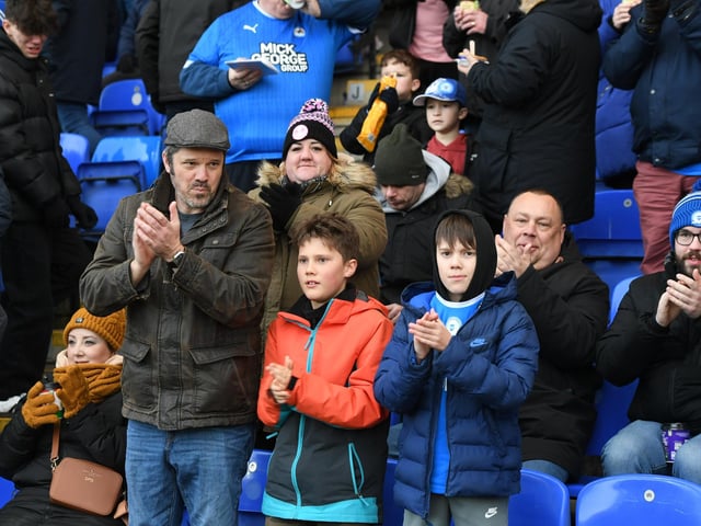 Peterborough United fans take in the win over Shrewsbury Town.