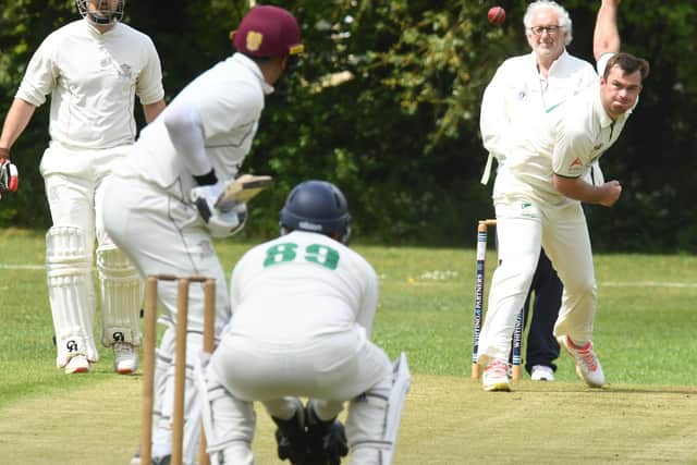 Connor Parnell on his way to 3-36 for Castor against Blunham. Photo: David Lowndes.