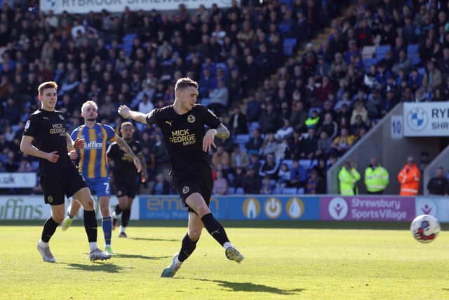 Jack Taylor scores to make it 3-0 to Posh. Photo: Joe Dent.