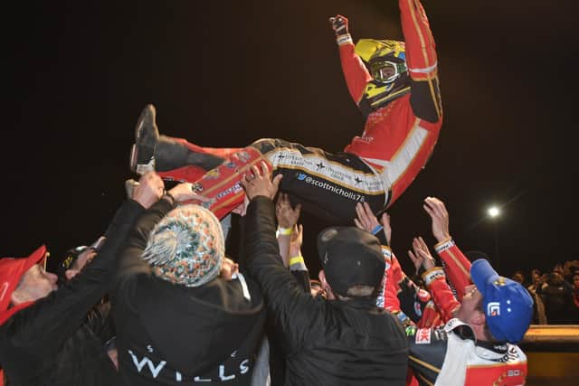 A traditional speedway celebration after Panthers win the 2021 Grand Final. Photo: David Lowndes.