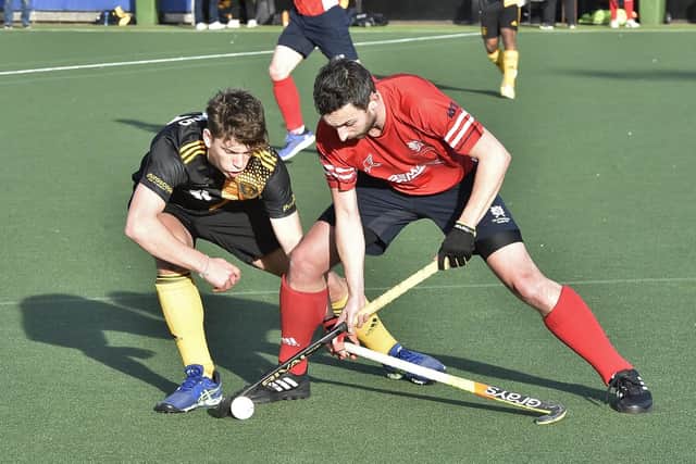 Action from City of Peterborough (red) v Beeston. Photo: David Lowndes.