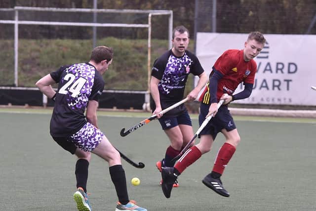 Hockey action from City of Peterborough 5ths (red) v Bourne/Deeping 2nds at Bretton Gate. Photo: David Lowndes.
