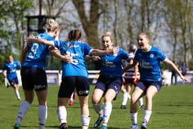 Posh Women celebrate their win at Doncaster Belles. Photo: Ruby Red Photography