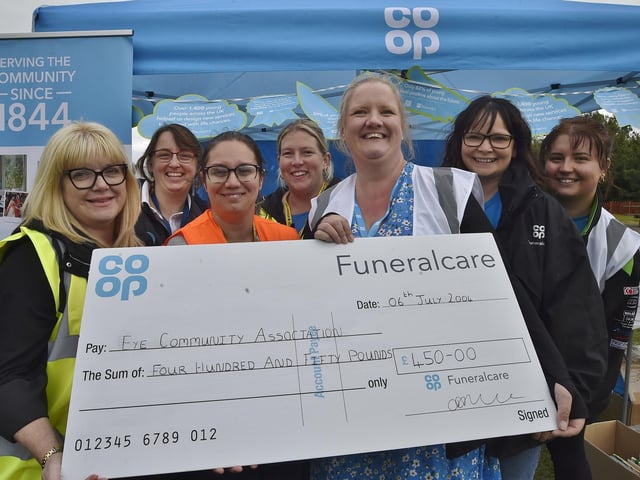 A  cheque presentation from the Co-Op Funeral care to the organisers.
