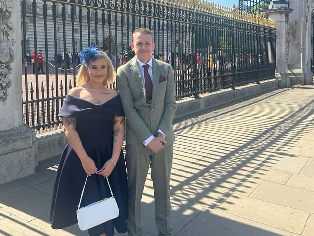 Dave Poulton and daughter Sienna Hayes-Palmer outside Buckingham Palace
