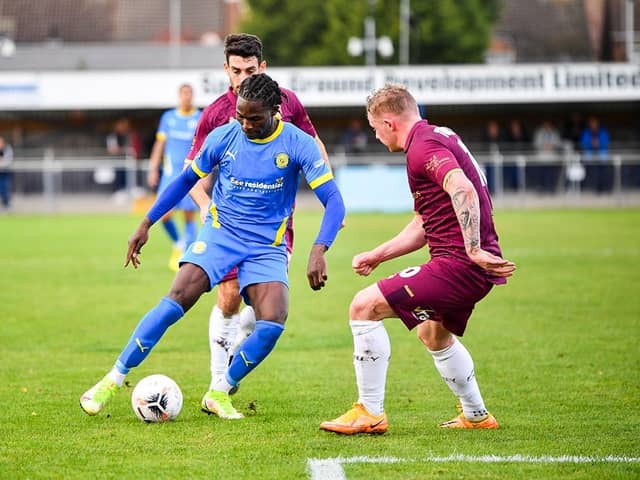 Maniche Sani (blue) in action for Sports against Chorley. Photo: James Richardson.