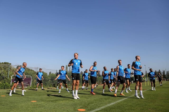 Peterborough United players warming up in Portugal.